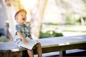 boy, laughing, reading-2604853.jpg