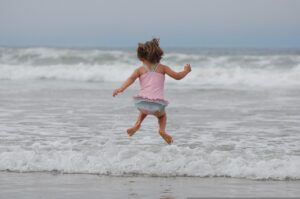 girl, beach, jump-495923.jpg